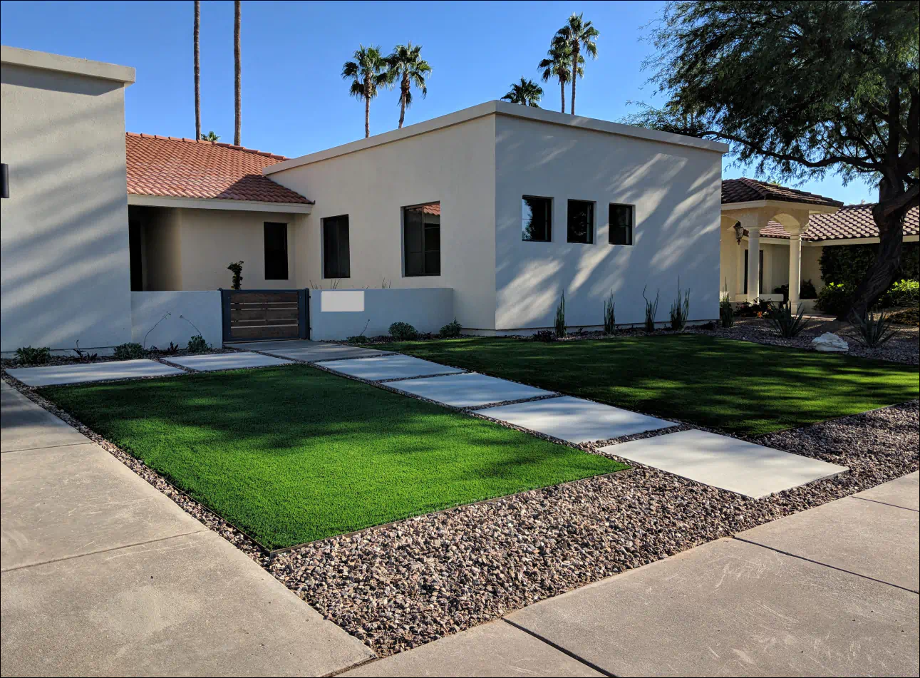 white house with a patio on front